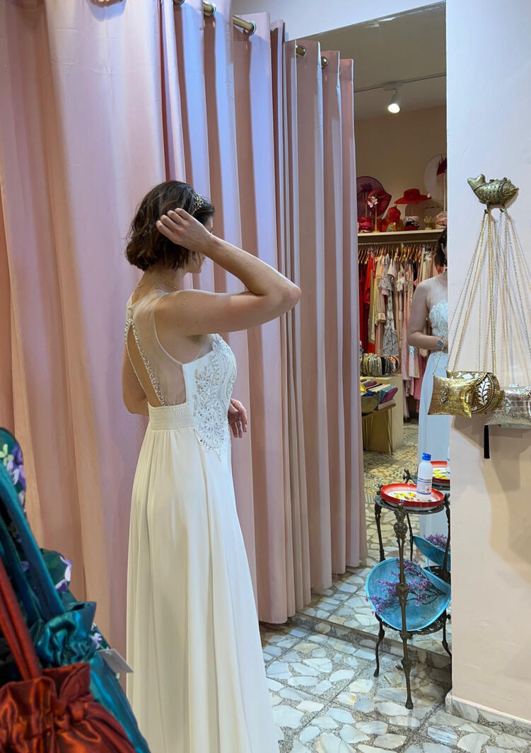 She found the dress, off the rack, in this boutique